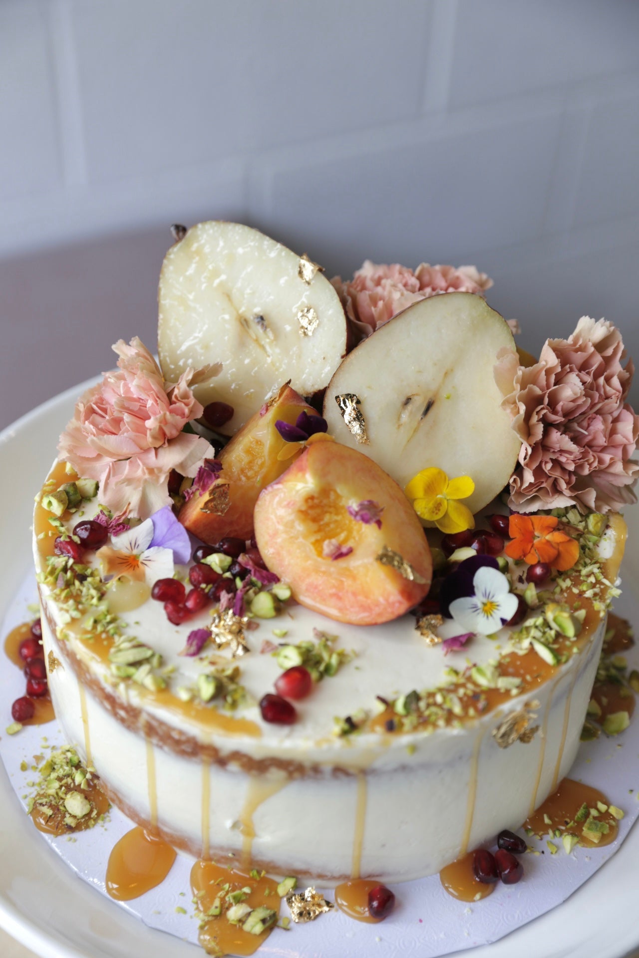 Almond cake with assorted fruit (8" 2 layer cake - serves 8-10)