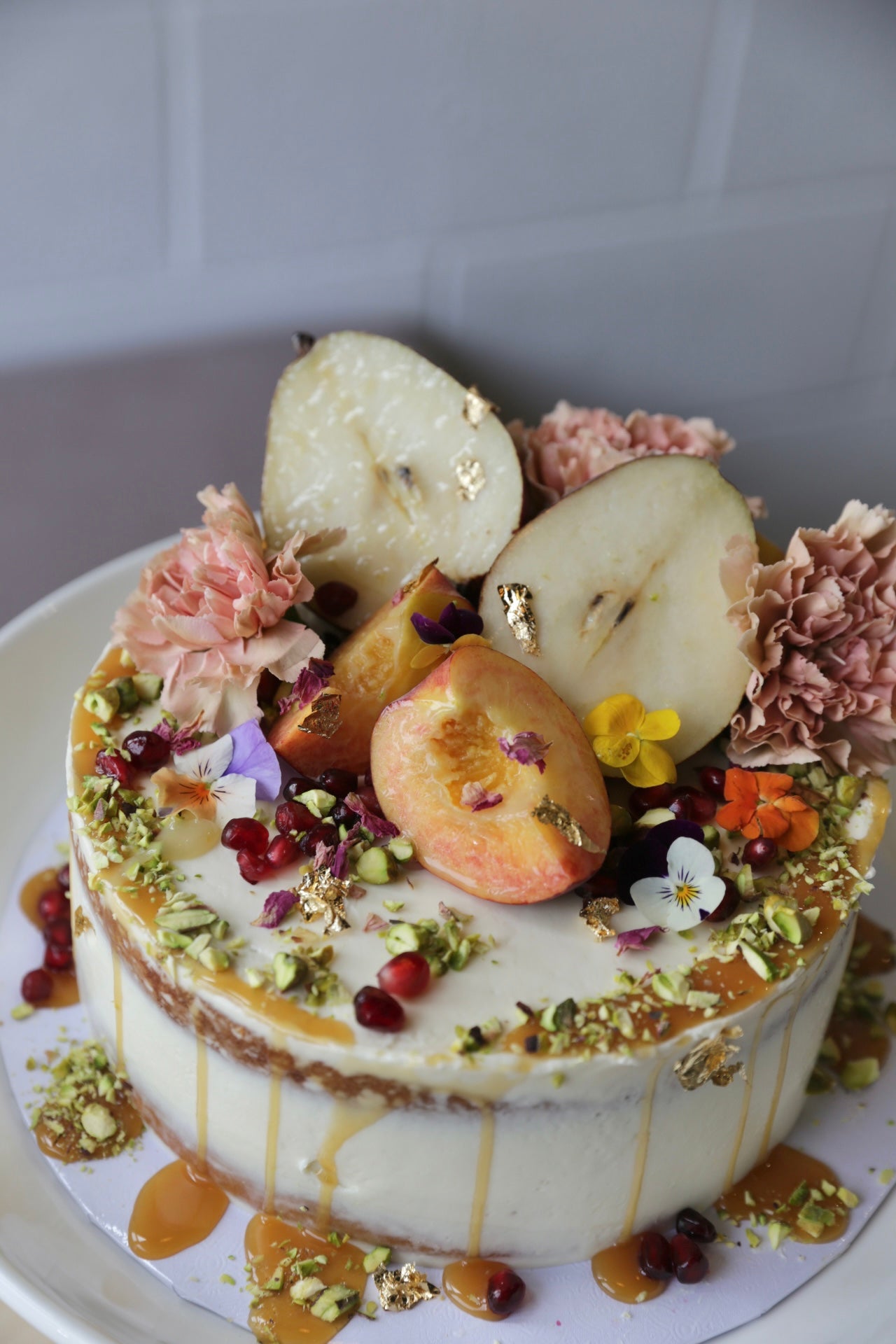 Almond cake with assorted fruit (8" 2 layer cake - serves 8-10)